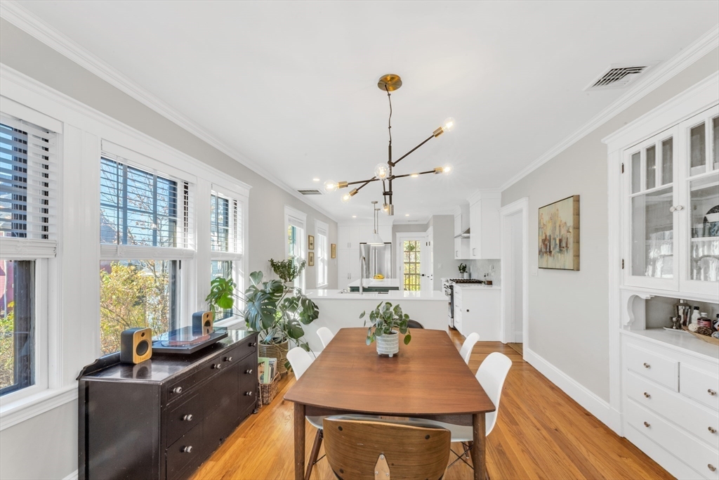 6 Arborough Road, Unit 2 Boston, MA 02131 - Photo 16 of 40 a living room with furniture and a table