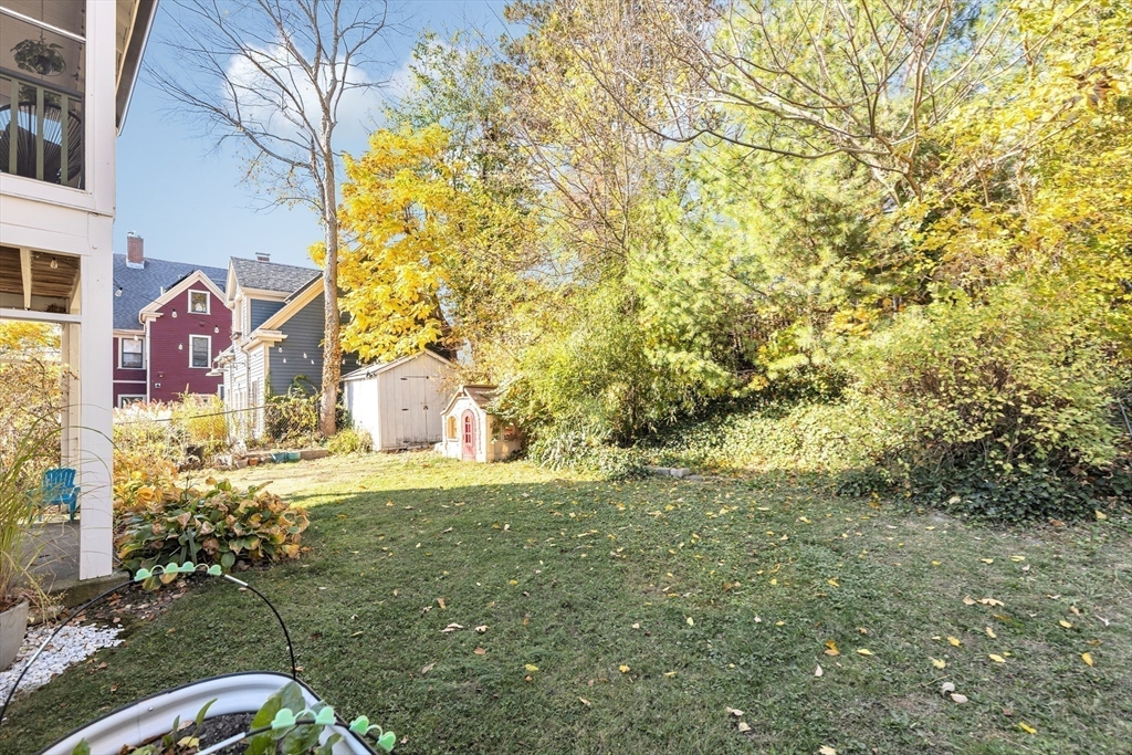 6 Arborough Road, Unit 2 Boston, MA 02131 - Photo 33 of 40 a backyard of a house