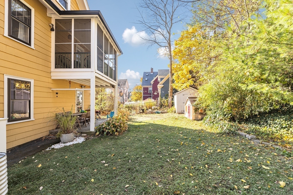 6 Arborough Road, Unit 2 Boston, MA 02131 - Photo 34 of 40 a view of back yard of the house
