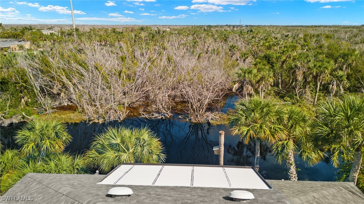 838-840 Rabbit Road Sanibel, FL 33957 - Photo 31 of 38 a view of a yard