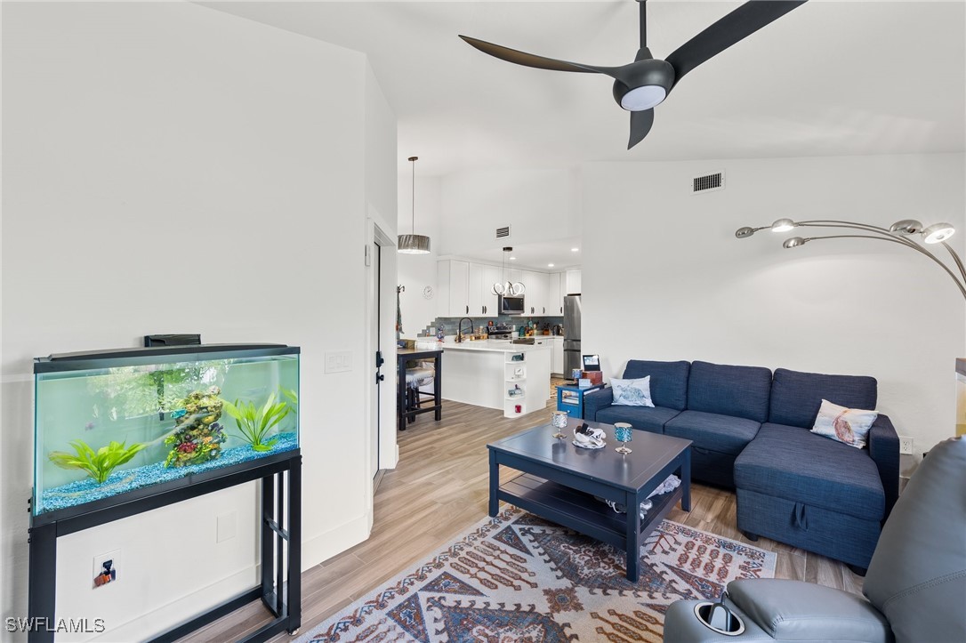 838-840 Rabbit Road Sanibel, FL 33957 - Photo 6 of 38 a living room with furniture and a flat screen tv