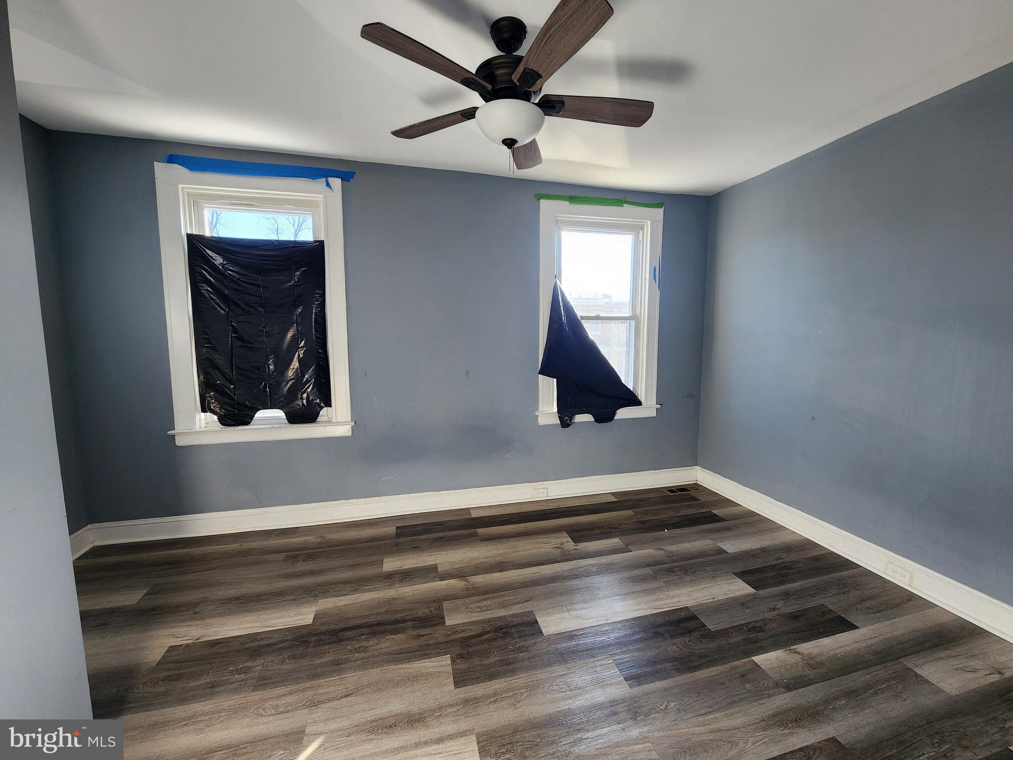 3208 Elmley Avenue Baltimore, MD 21213 - Photo 20 of 30 a view of empty room with window and ceiling fan