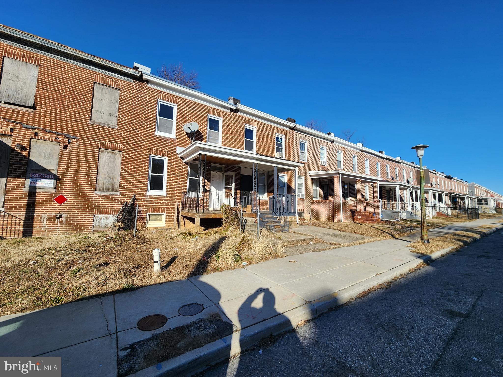 3208 Elmley Avenue Baltimore, MD 21213 - Photo 2 of 30 a view of a building with large windows