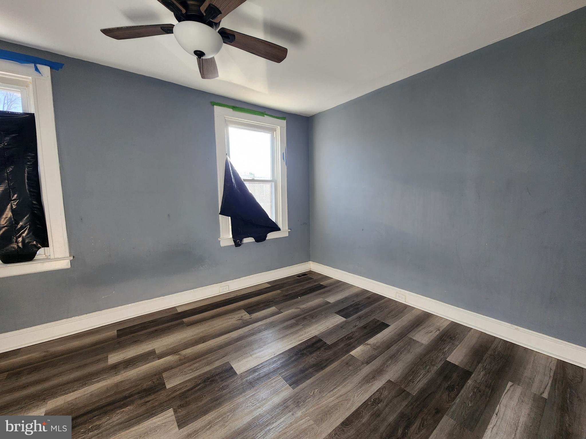 3208 Elmley Avenue Baltimore, MD 21213 - Photo 21 of 30 a view of empty room with window and ceiling fan