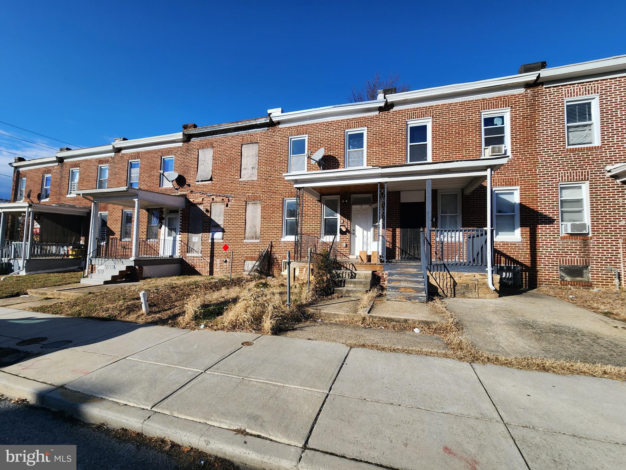 3208 Elmley Avenue Baltimore, MD 21213 - Photo 4 of 30 a view of a house with a patio