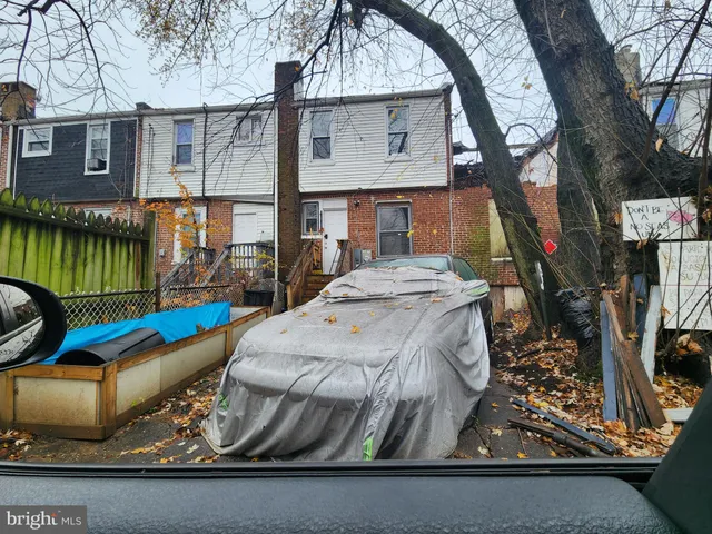 a view of outdoor kitchen and patio