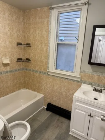 a bathroom with a sink and a bathtub