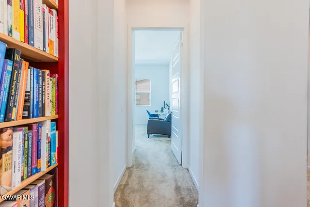 a bathroom with double sink and a mirror