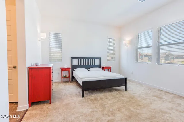 a workspace with furniture and a window