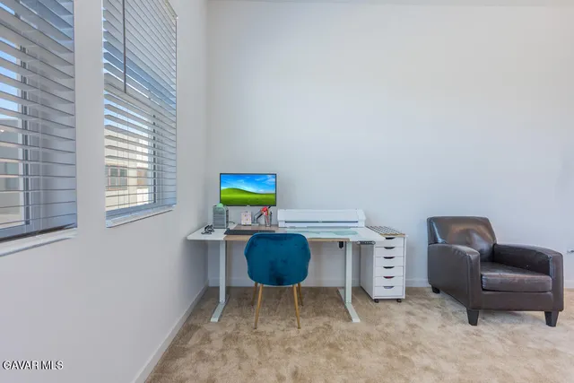 a room with furniture and window