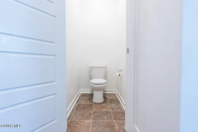 a balcony with view of outdoor space