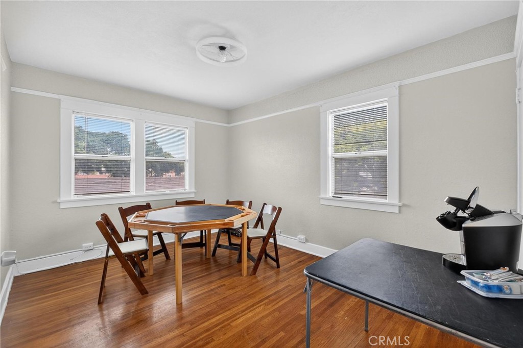 1524 East Hellman Street Long Beach, CA 90813 - Photo 28 of 33 a view of a dining room with furniture and wooden floor