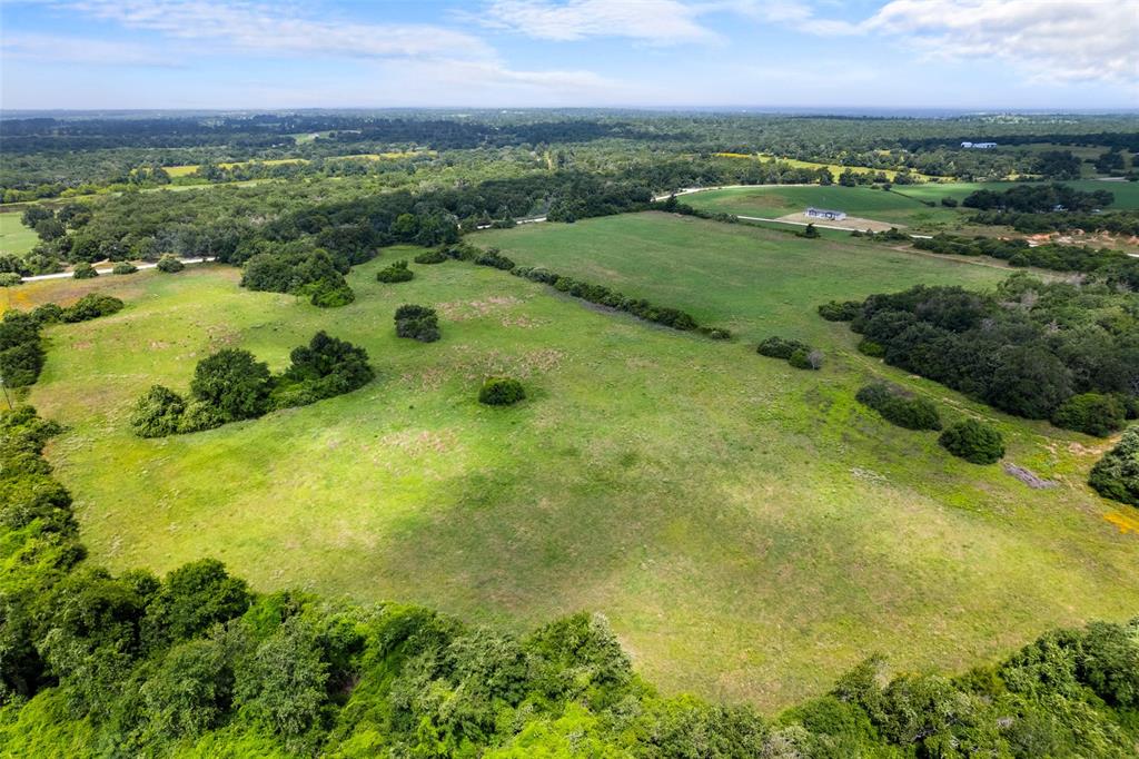 2874 Old Boone Prairie Road Franklin, TX 77856 - Photo 12 of 13 a view of a lake with a city