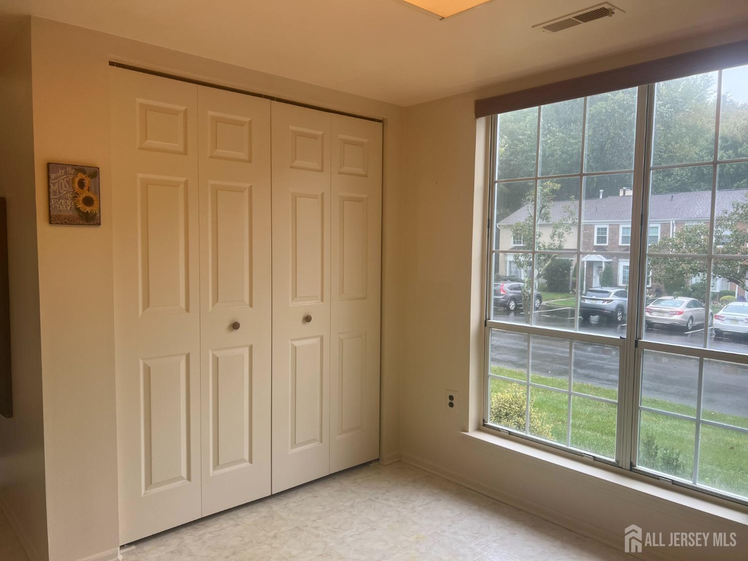 143 Archery Court Old Bridge, NJ 08857 - Photo 16 of 29 a view of an empty room with a window
