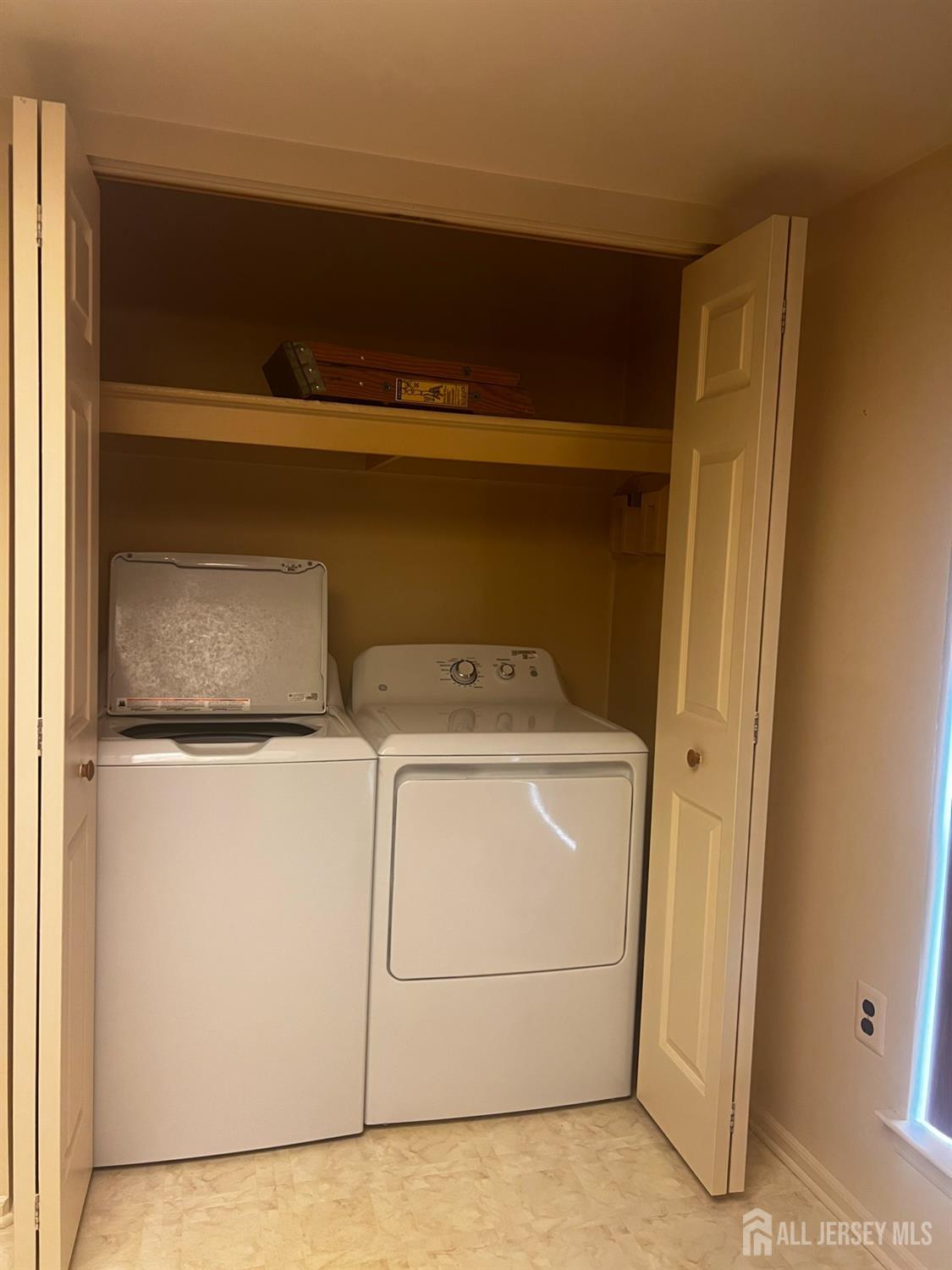 143 Archery Court Old Bridge, NJ 08857 - Photo 17 of 29 a utility room with dryer and washer