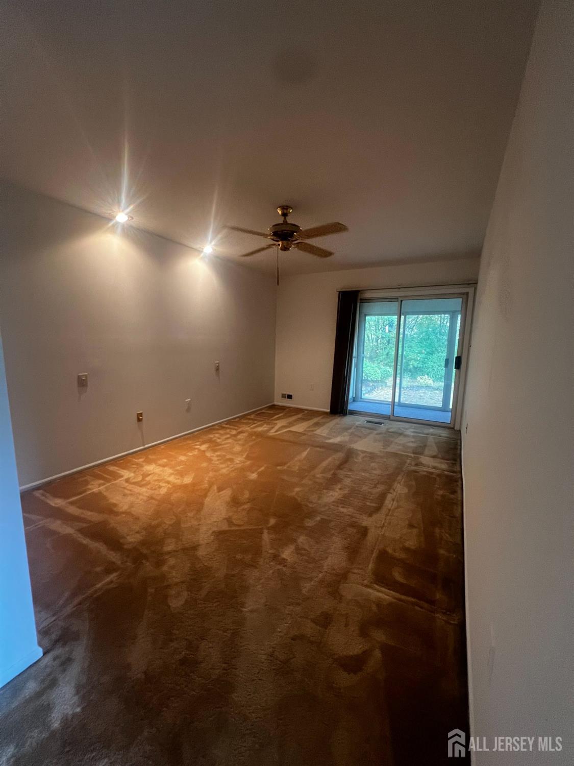 143 Archery Court Old Bridge, NJ 08857 - Photo 18 of 29 a view of an empty room with a window