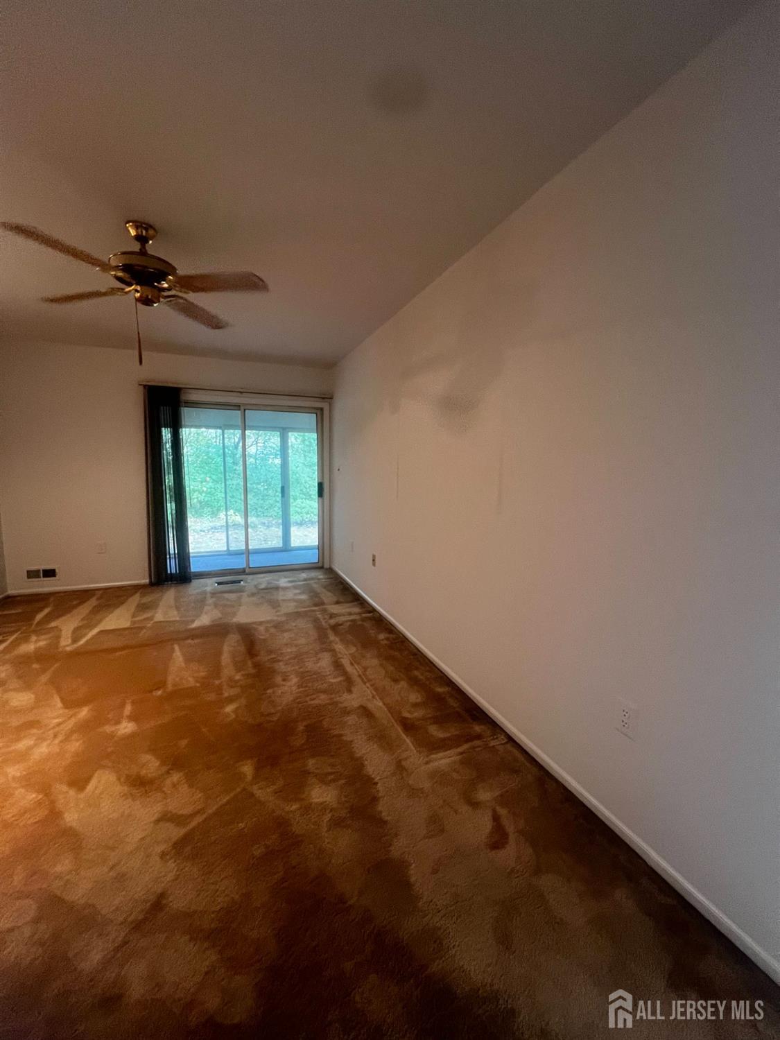 143 Archery Court Old Bridge, NJ 08857 - Photo 19 of 29 a view of an empty room with a window