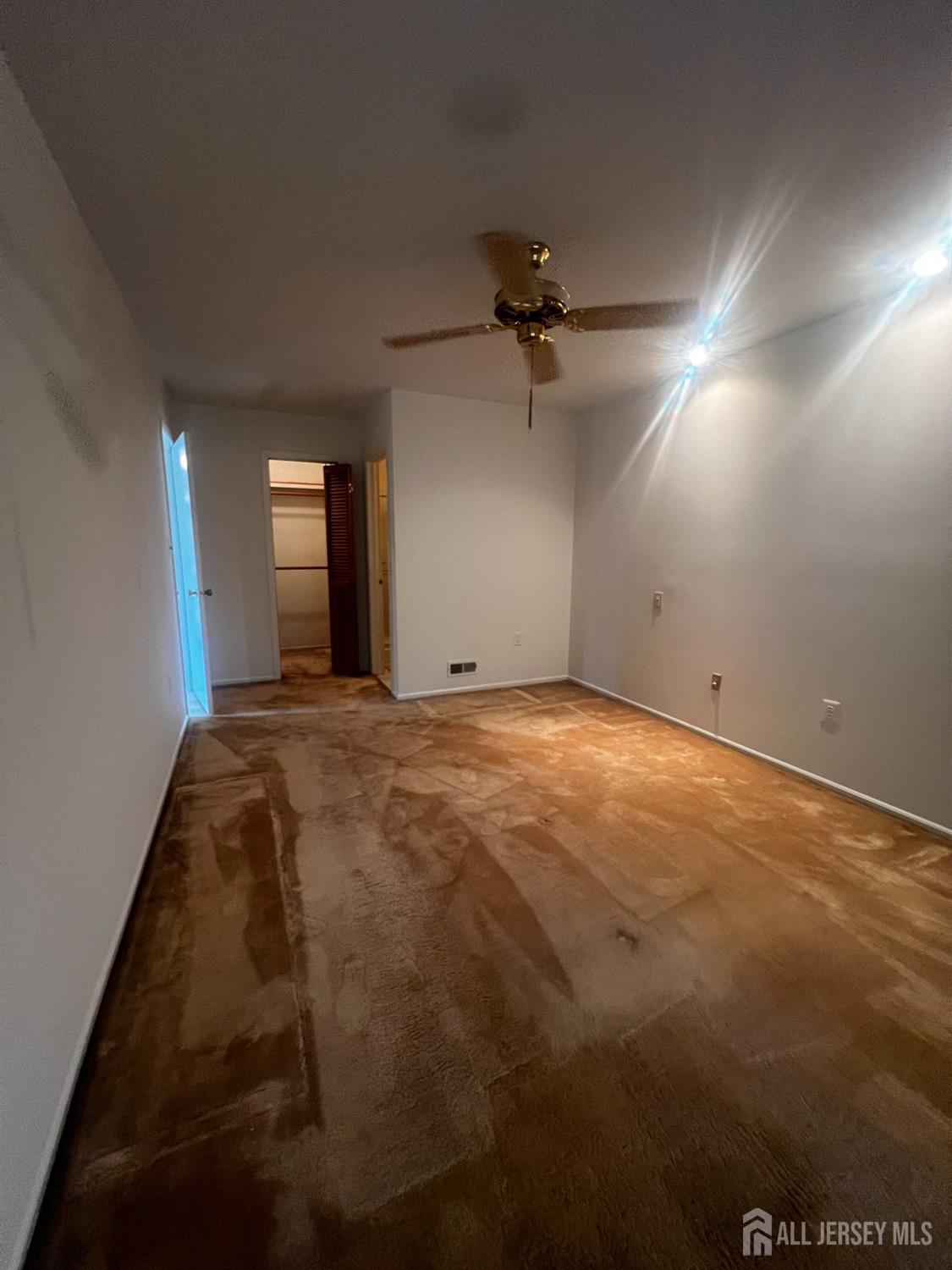 143 Archery Court Old Bridge, NJ 08857 - Photo 20 of 29 a view of a big room with windows