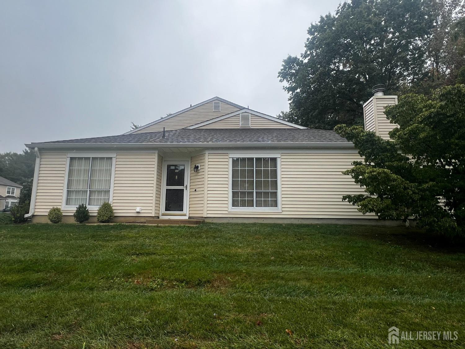 143 Archery Court Old Bridge, NJ 08857 - Photo 2 of 29 a front view of a house with a garden