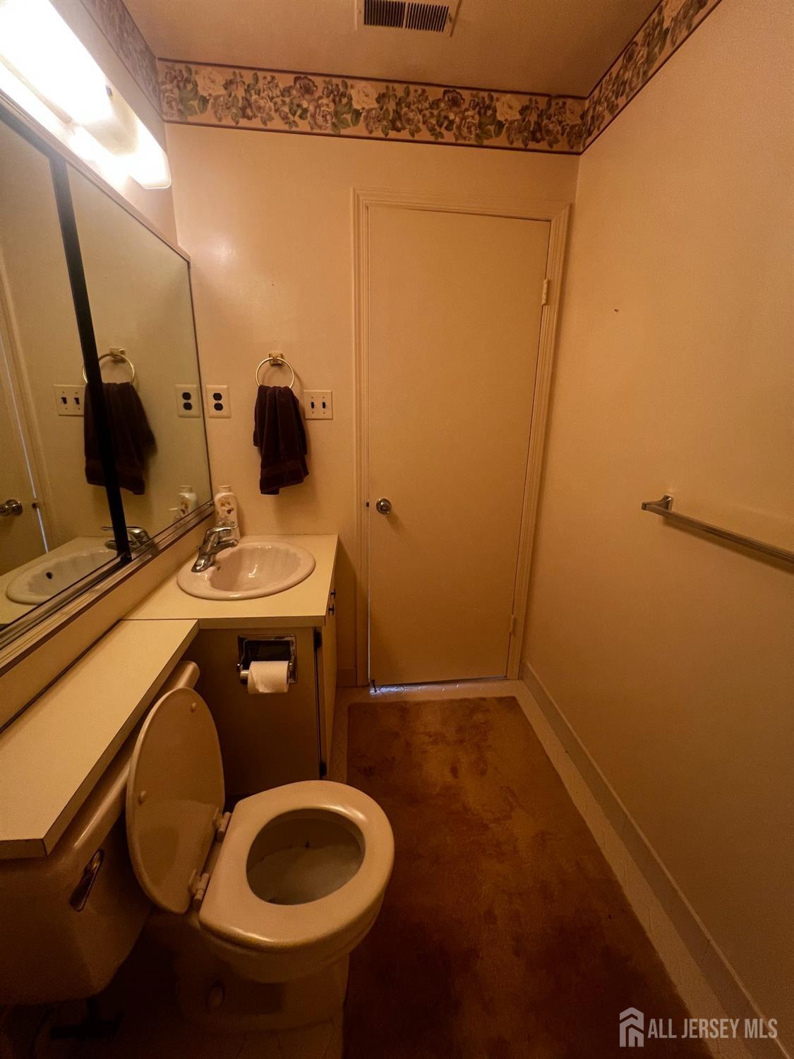 143 Archery Court Old Bridge, NJ 08857 - Photo 27 of 29 a bathroom with a sink and toilet