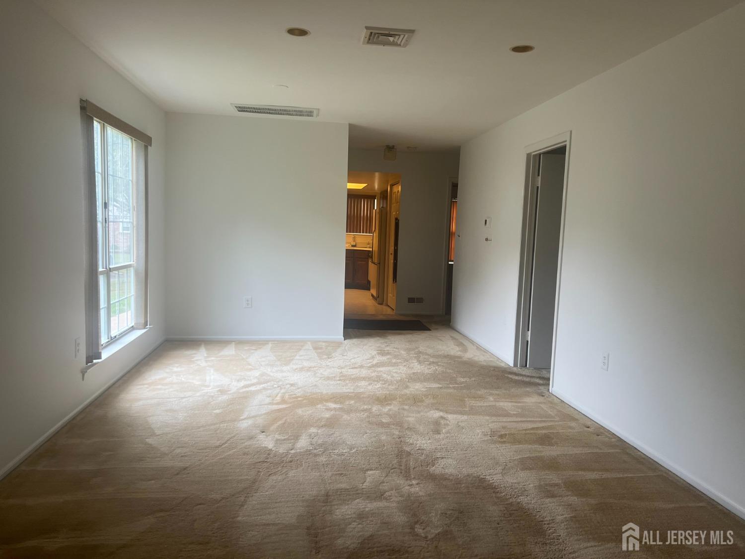 143 Archery Court Old Bridge, NJ 08857 - Photo 7 of 29 a view of an empty room and window