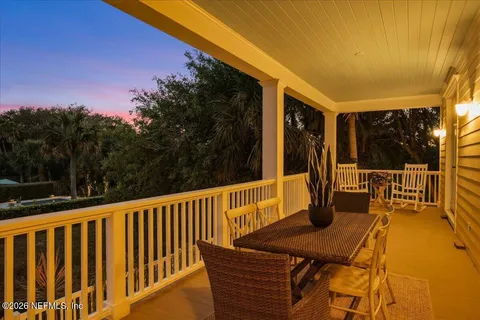 an aerial view of a house with a garden and plants