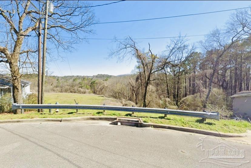 9651 Westfield Road Birmingham, AL 35217 - Photo 1 of 2 a view of a road with a yard