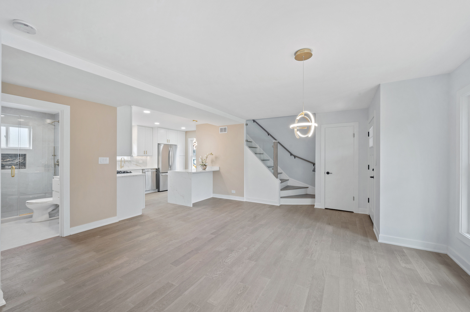 406 North Elm Street Mount Prospect, IL 60056 - Photo 8 of 28 a view of empty room with wooden floor and windows