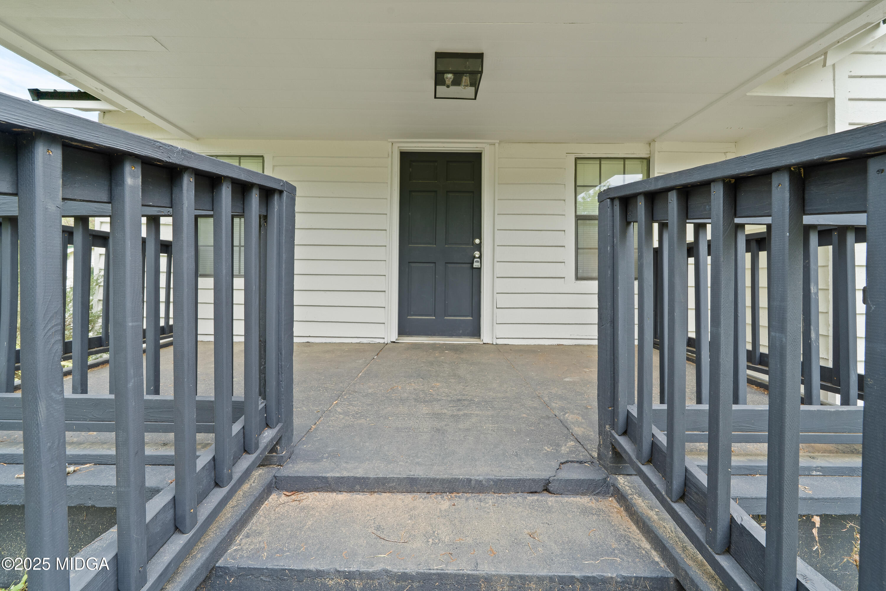1512 Highway 22 Haddock, GA 31033 - Photo 2 of 32 a view of a porch