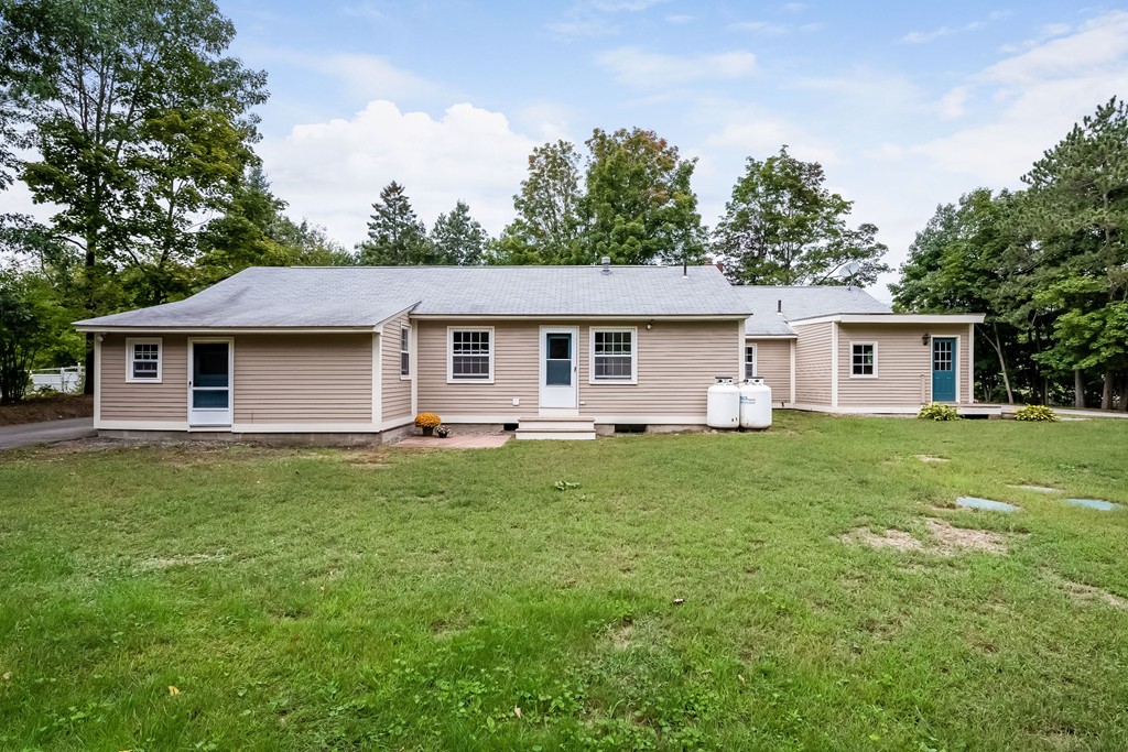 6-a&b Proctor Hill Road Hollis, NH 03049 - Photo 29 of 30 a front view of house with yard and green space