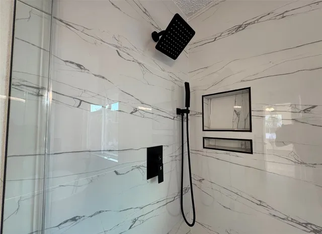 a view of a hallway with a room