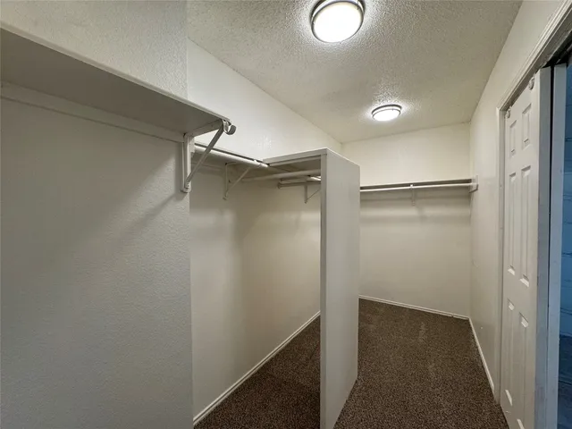 a white bath tub sitting in a bathroom