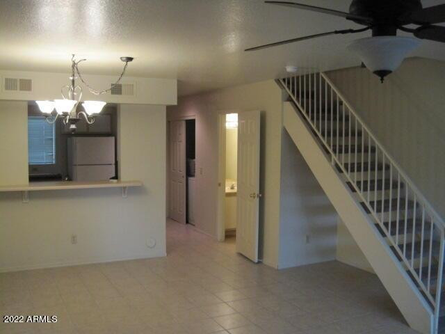 715 South Ext Road, Unit 25 Mesa, AZ 85210 - Photo 4 of 4 a view of a hallway with dining area