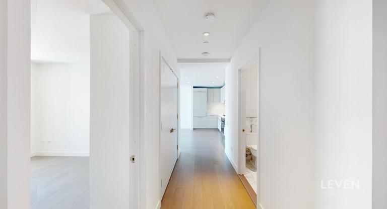 305 East 51st Street, Unit RU5A Manhattan, NY 10022 - Photo 13 of 15 a view of a hallway with a white walls
