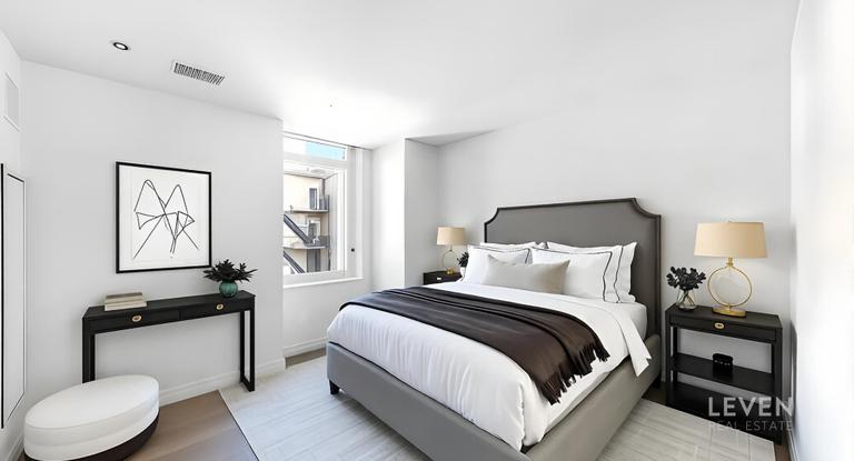 305 East 51st Street, Unit RU5A Manhattan, NY 10022 - Photo 8 of 15 a bedroom with a bed and a lamp