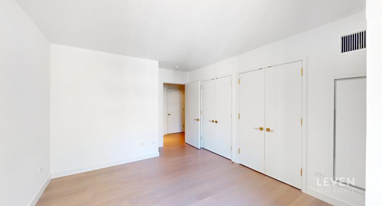 305 East 51st Street, Unit RU5A Manhattan, NY 10022 - Photo 10 of 15 a view of an empty room