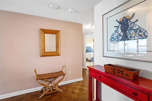 a bedroom with a bed and dresser