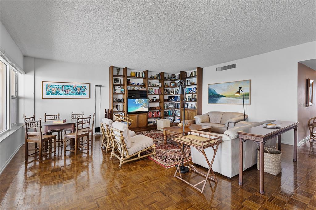 Undisclosed Address Longboat Key, FL 34228 - Photo 3 of 68 a living room with furniture and wooden floor