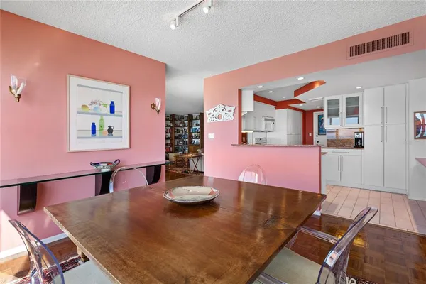 a view of a dining room with furniture