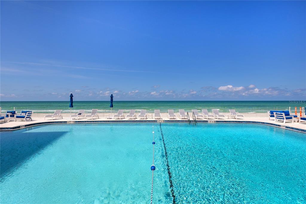 Undisclosed Address Longboat Key, FL 34228 - Photo 57 of 68 a view of a swimming pool and an outdoor space
