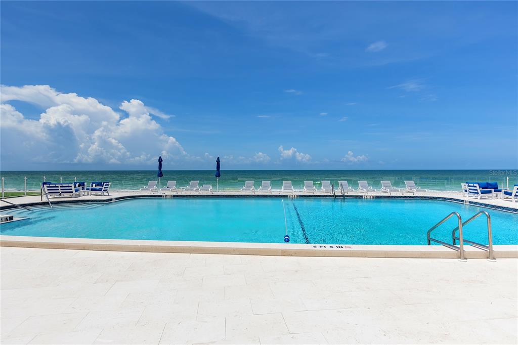 Undisclosed Address Longboat Key, FL 34228 - Photo 66 of 68 a view of a swimming pool and a yard