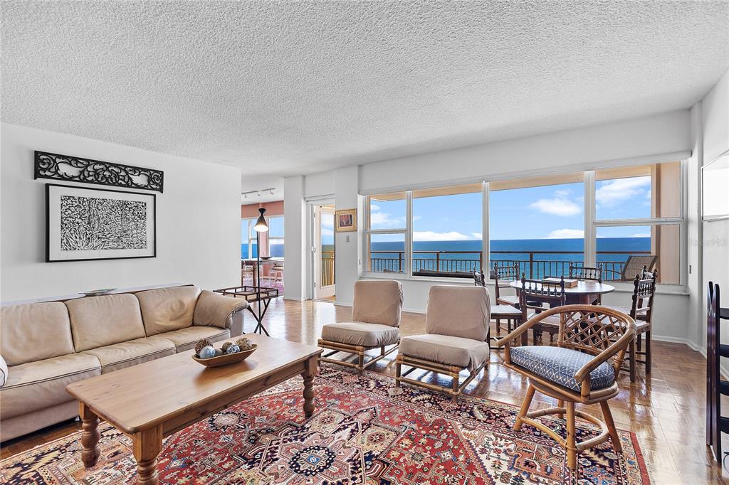 601 Longboat Club Road, Unit 902S Longboat Key, FL 34228 - Photo 10 of 65 a living room with furniture and a large window