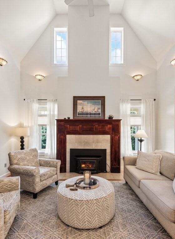 15 Stagecoach Road Princeton, MA 01541 - Photo 11 of 41 a living room with furniture a fireplace and a large window