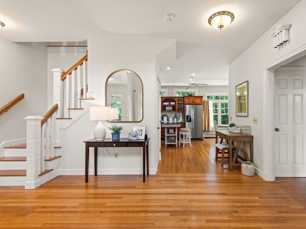 15 Stagecoach Road Princeton, MA 01541 - Photo 13 of 41 a living room with fireplace furniture and a wooden floor