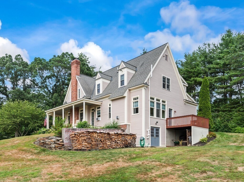 15 Stagecoach Road Princeton, MA 01541 - Photo 40 of 41 a front view of a house with garden