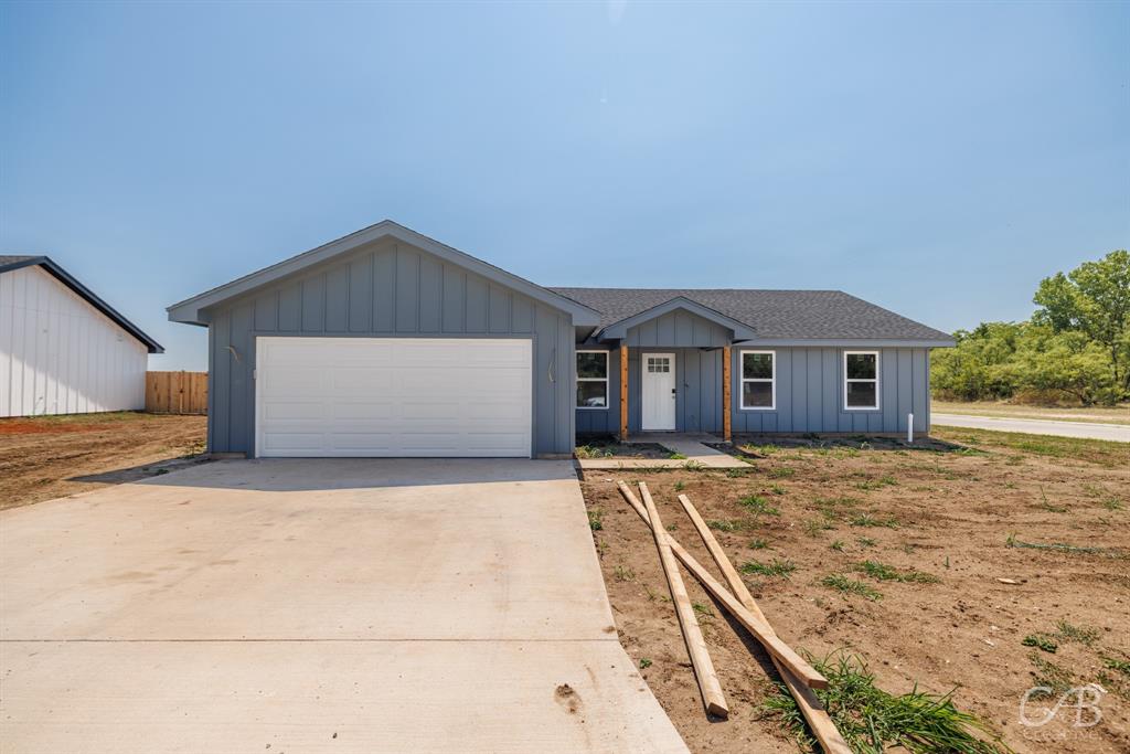 a front view of house with yard