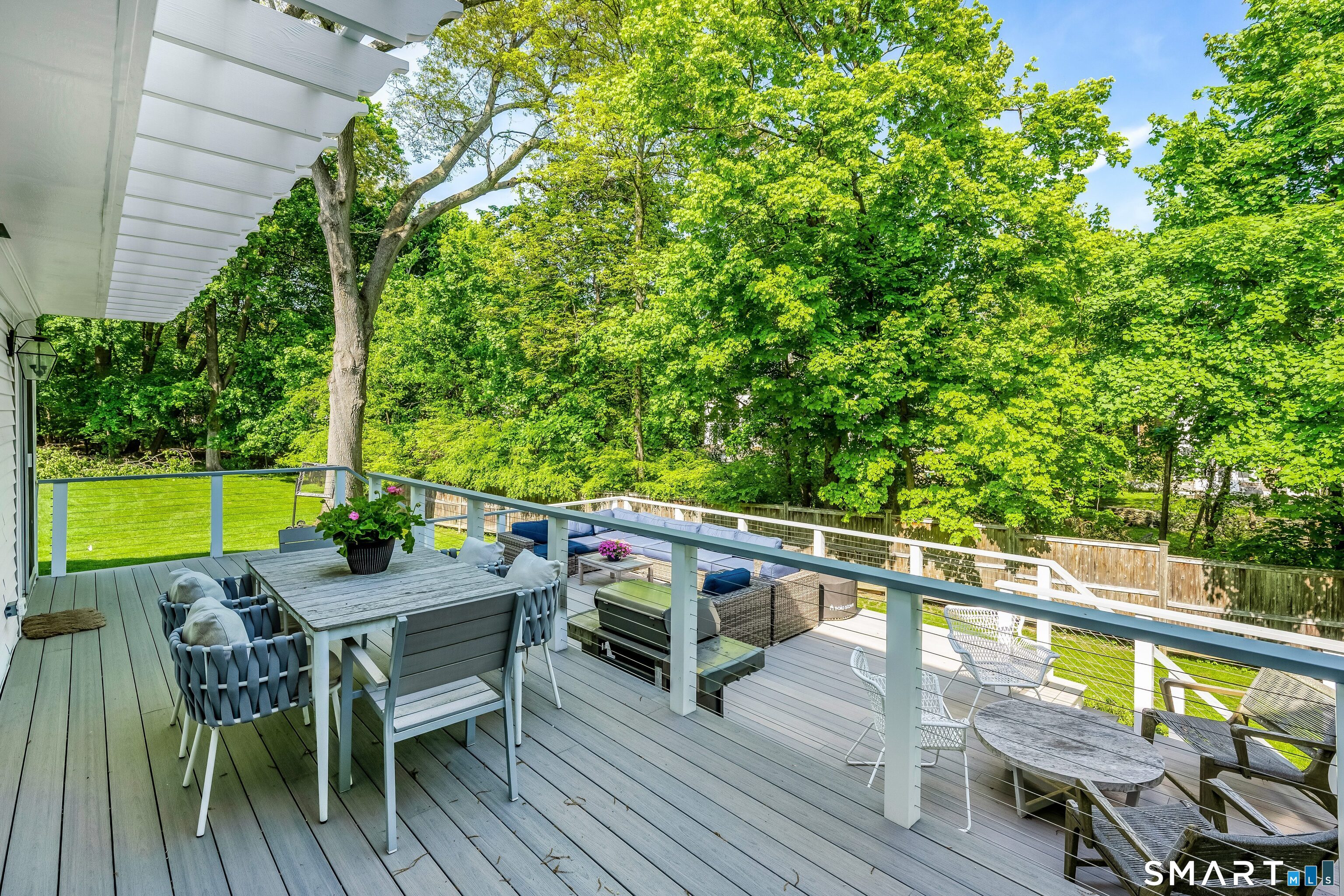 27 Point O Woods Road South Darien, CT 06820 - Photo 26 of 32 a view of deck with furniture and garden