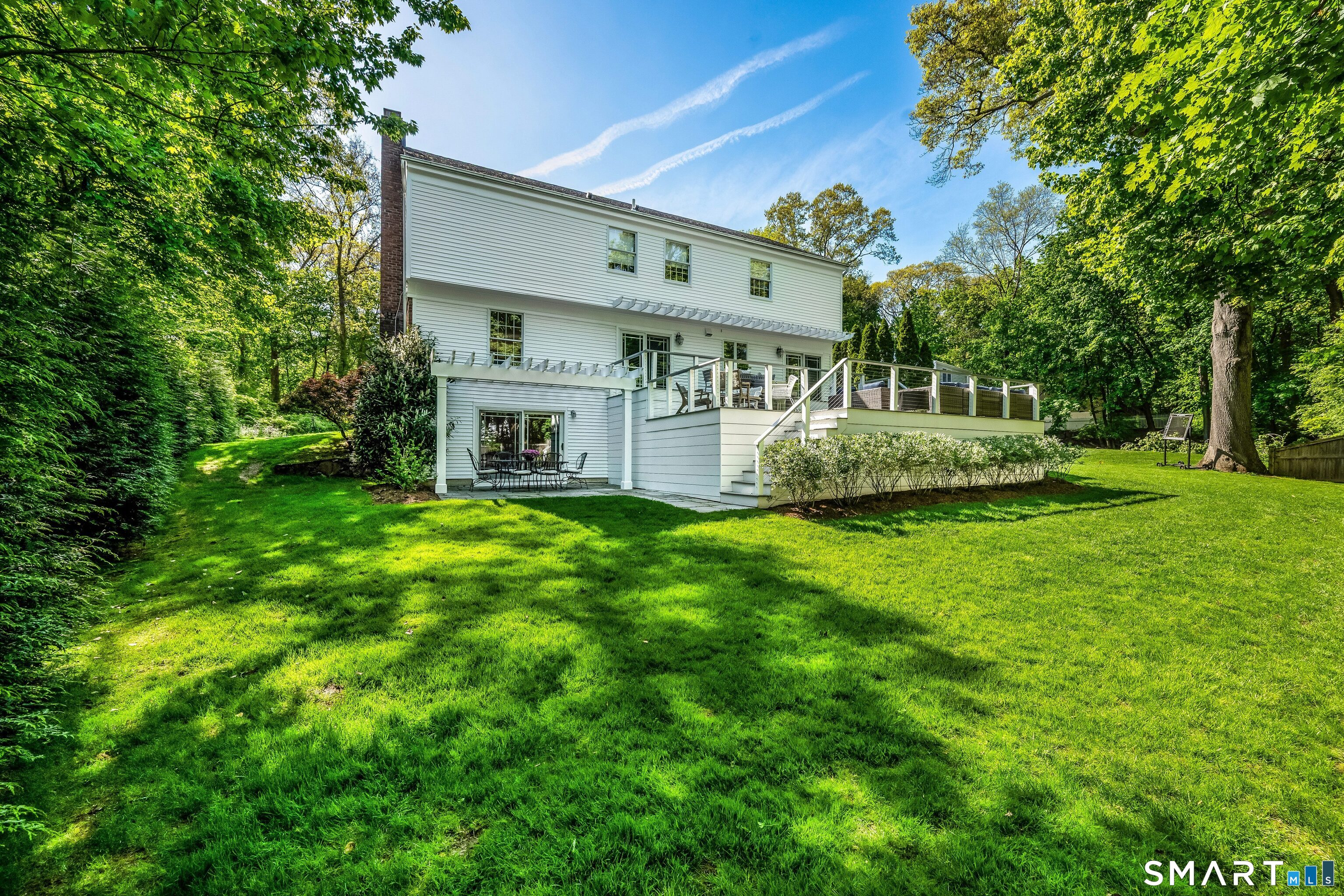 27 Point O Woods Road South Darien, CT 06820 - Photo 28 of 32 a front view of house with yard and green space