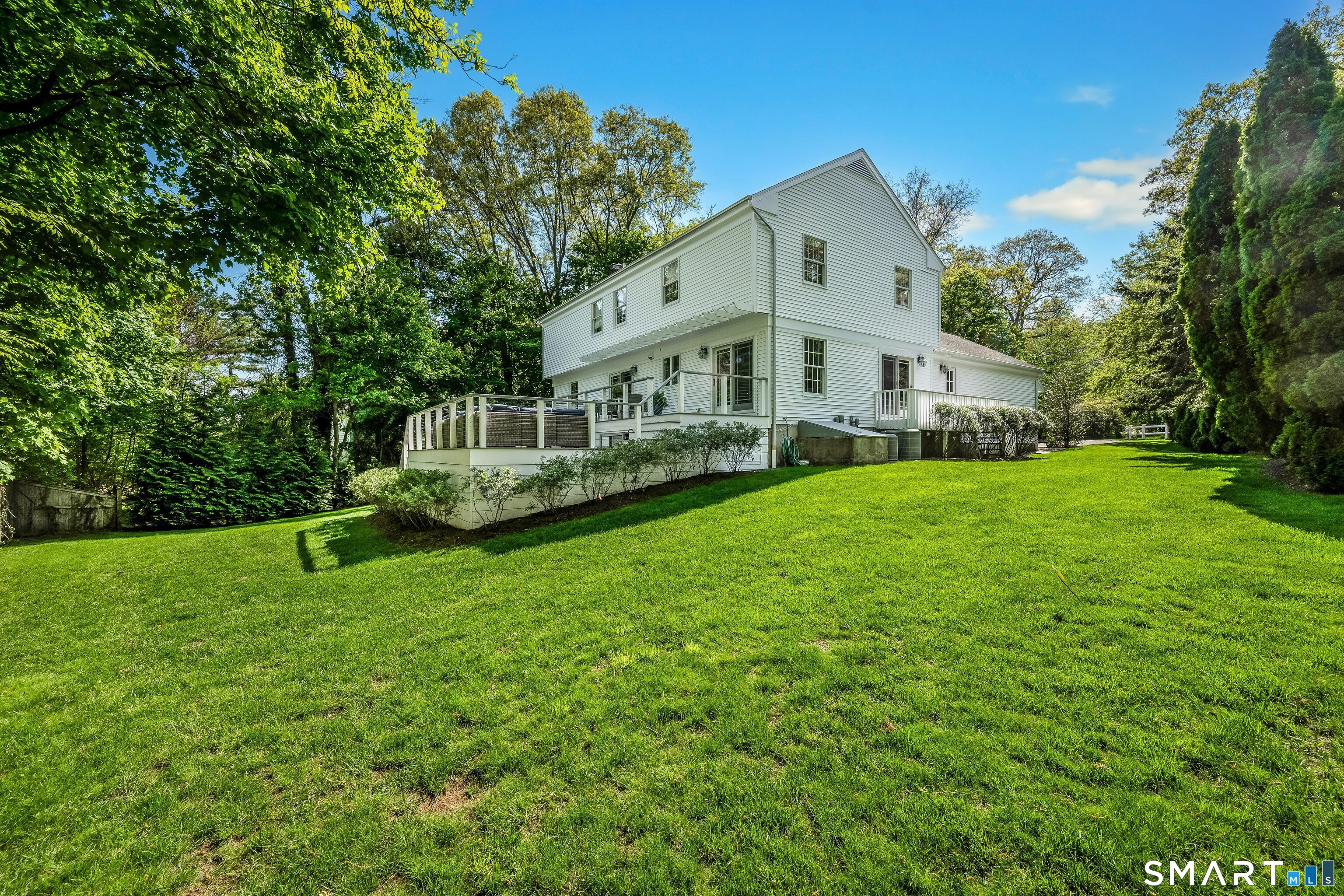 27 Point O Woods Road South Darien, CT 06820 - Photo 29 of 32 a view of a house with a yard