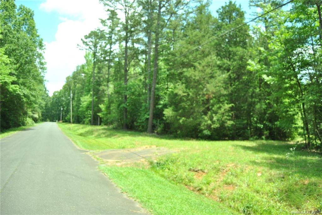3502 Penshurst Road, Unit TRACT #11 Rock Hill, SC 29730 - Photo 9 of 10 a view of a backyard with large trees
